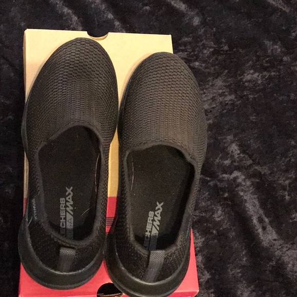 sketchers black slip ons